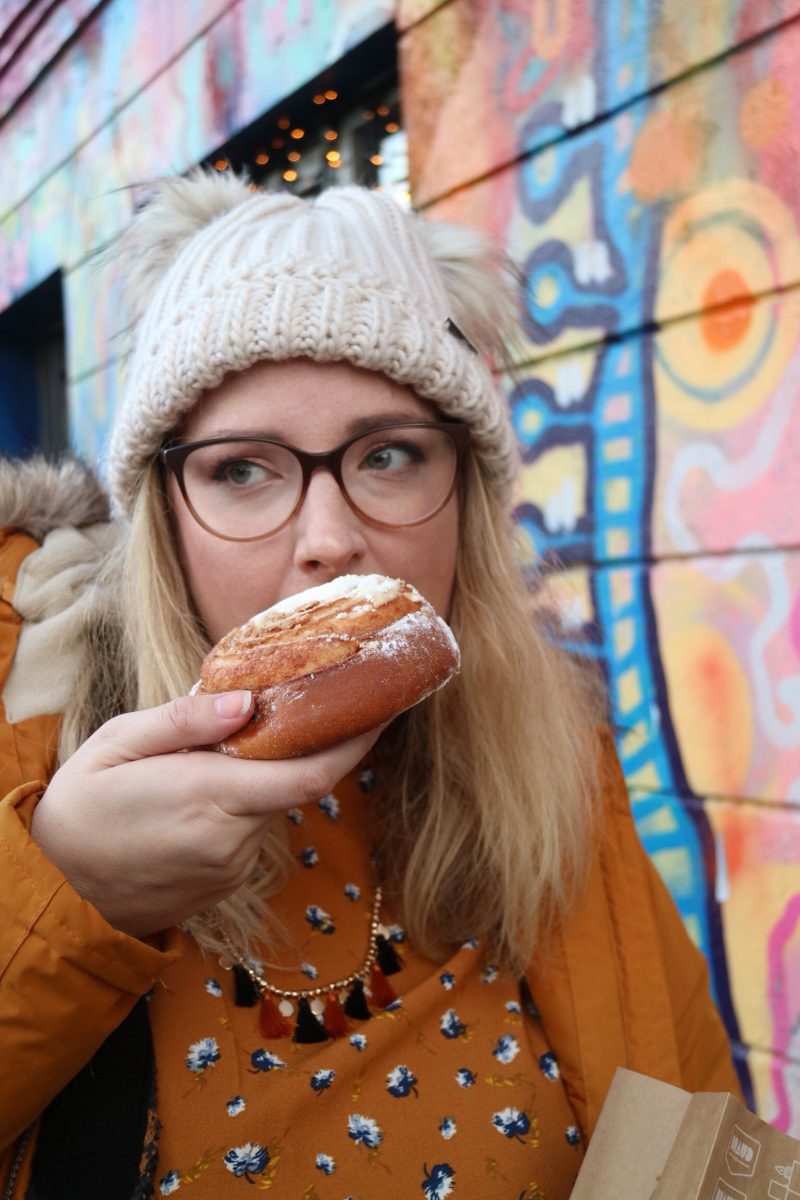 Me eating a cinnamon bun from braud & co