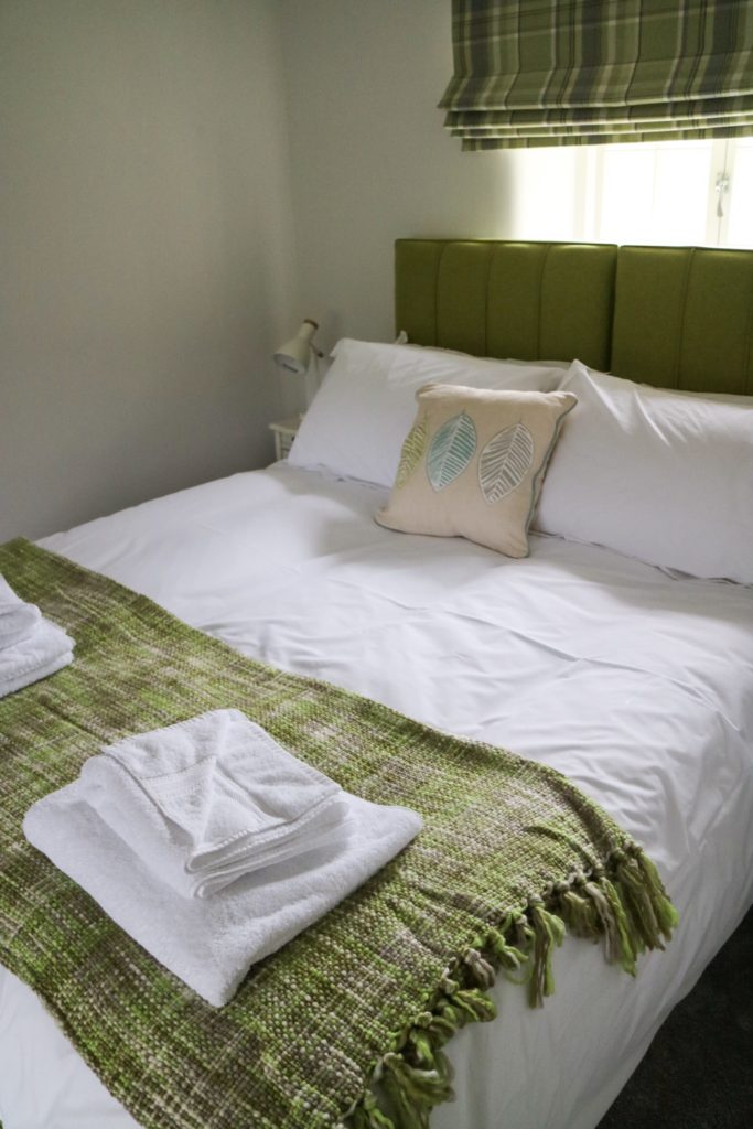 bedroom of carr cottage at harewood holidays