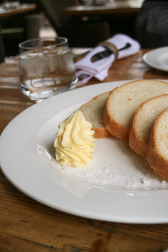 locally made bread with butter and salt flakes in the ye olde bell spa restaurant 
