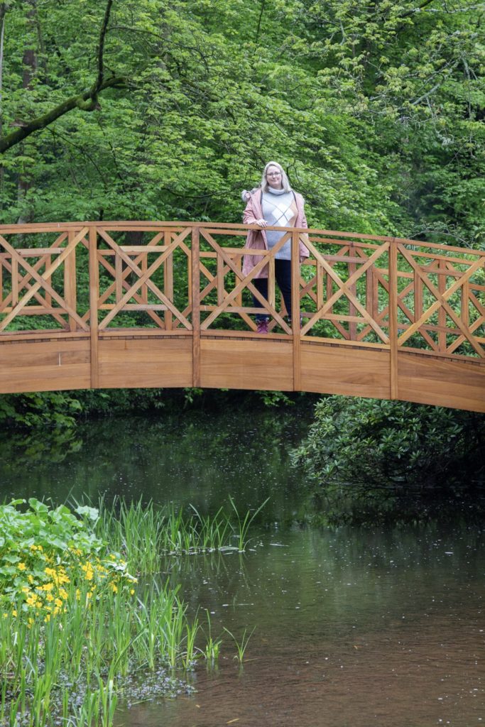 me on a bridge in harewood house gardens 