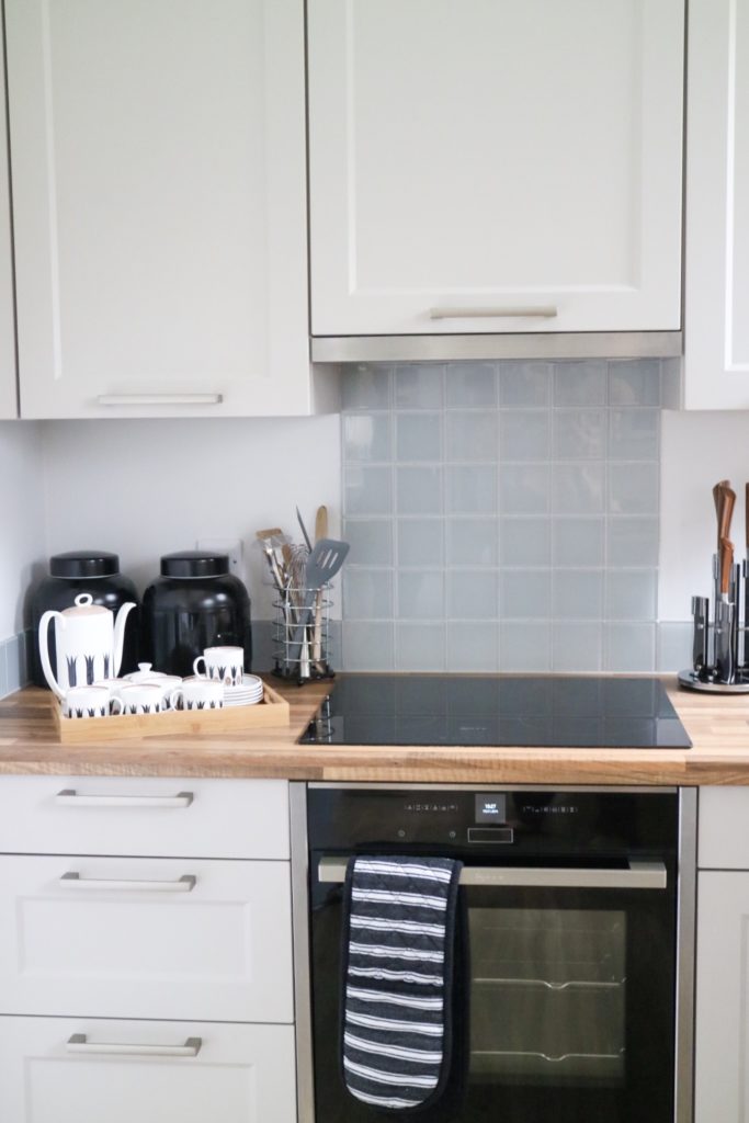 kitchen with oven and teapot on the side 