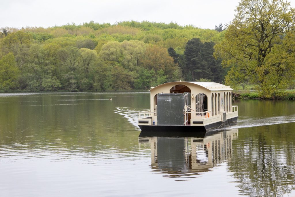 chain ferry going across the lake