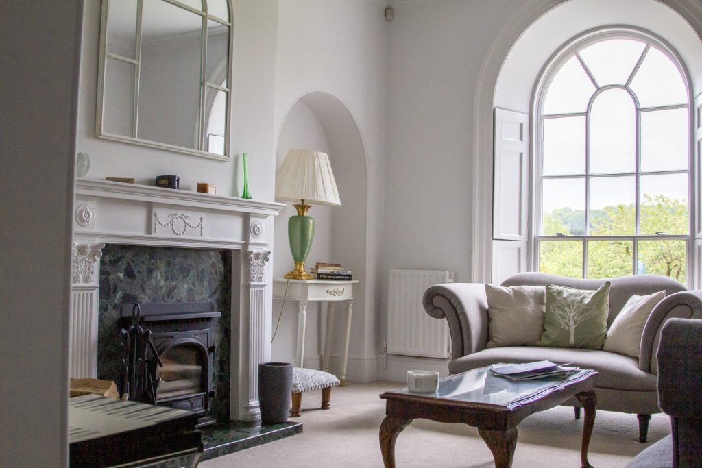 lounge area of one of the cottages including a fireplace 