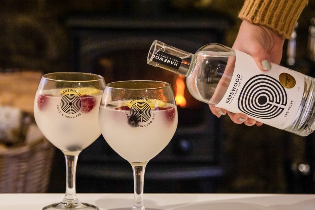 gin being poured into glasses