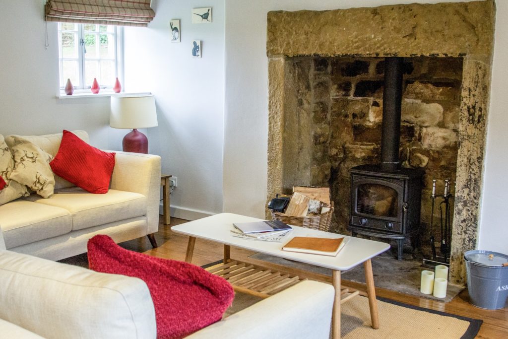 the lounge area of carr cottage at harewood holidays