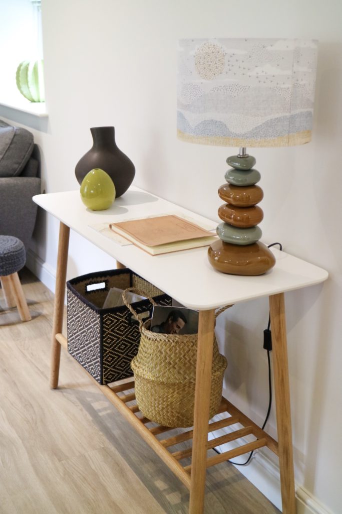 ornaments and a lamp on a table 