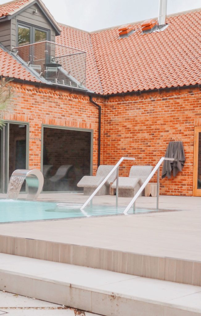outside pool and heated beds at the inside of the pool at  ye olde bell spa