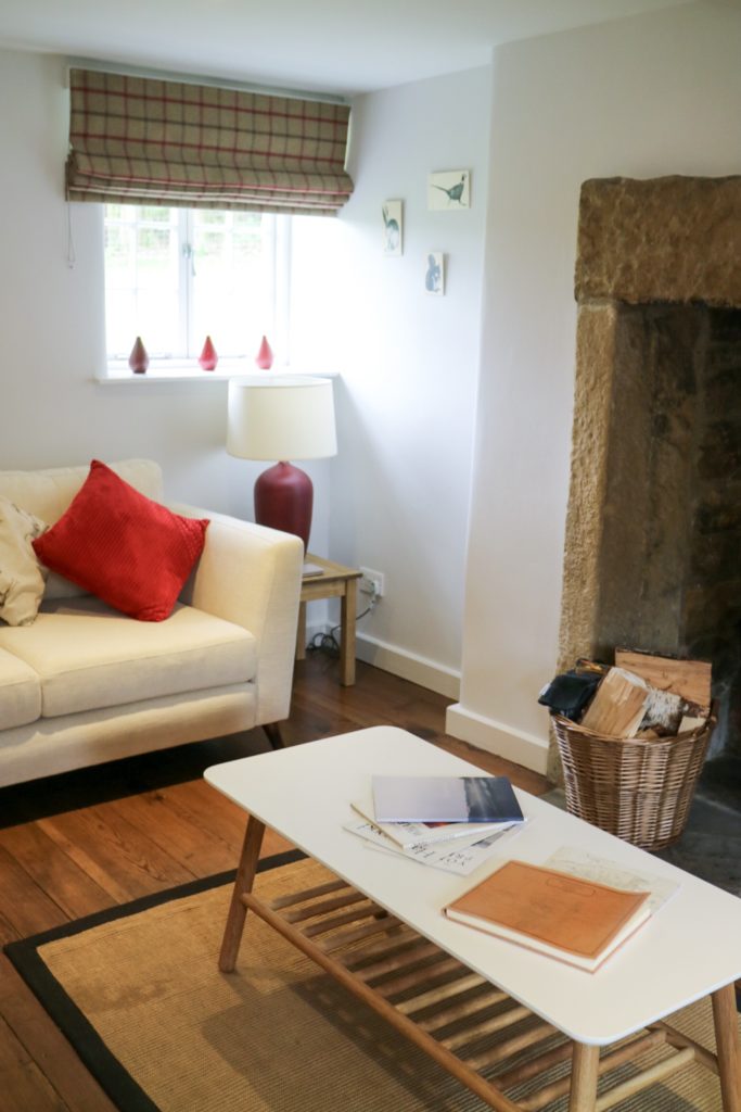 the lounge area of carr cottage at harewood holidays