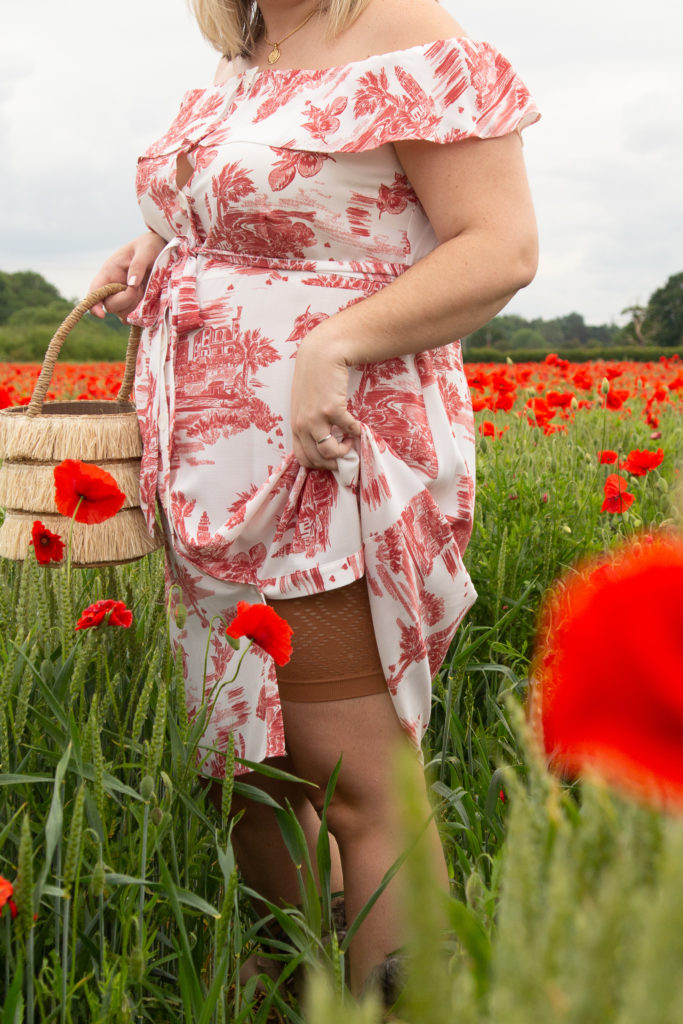 Big Bloomers Aztec Anti-chafing shorts under a dress in a poppy field 