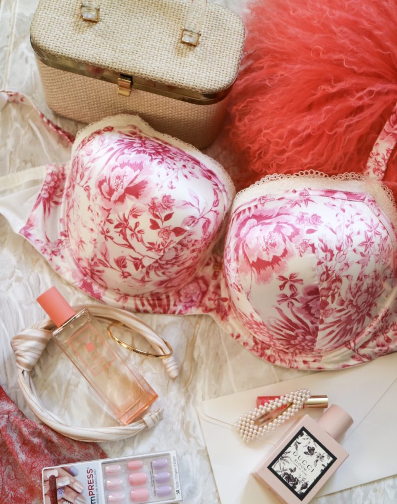 pink and cream patterned bra in a flatlay style