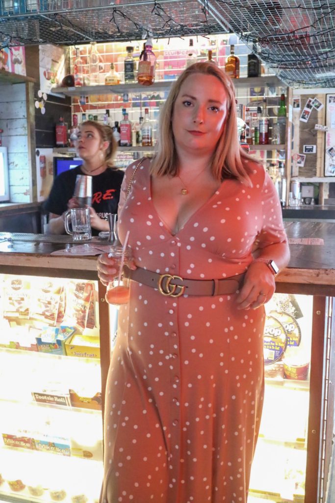 lucy stood at the convenience store bar in Manchester