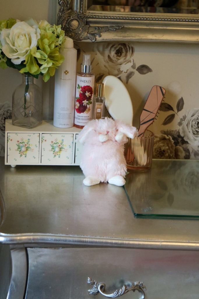 fluffy bunny on a dressing table