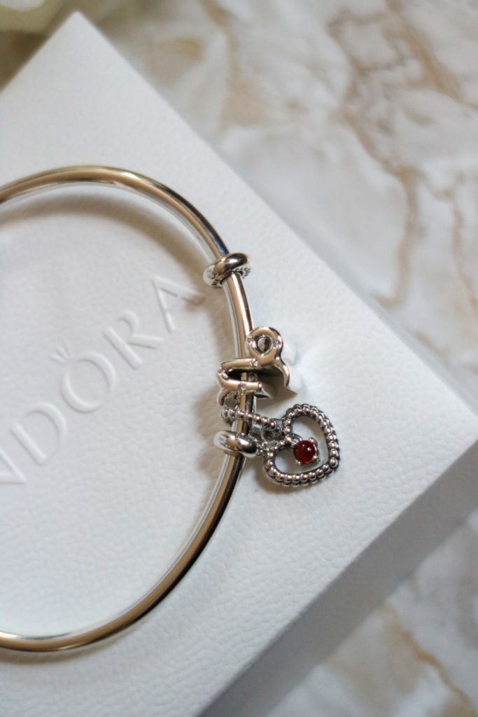 Pandora open bracelet with zodiac and birthstone charms