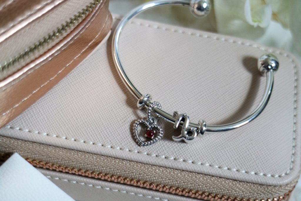 Pandora open bracelet with zodiac and birthstone charms